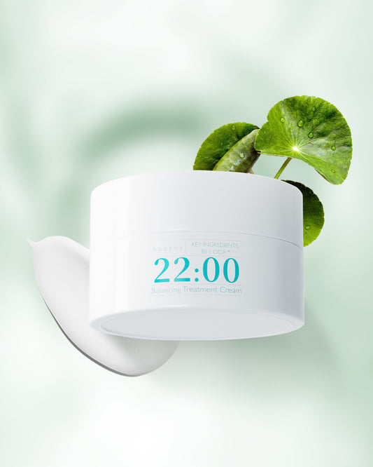 アネトス バランシング トリートメント クリームの容器と葉の画像、スキンケア製品を示す