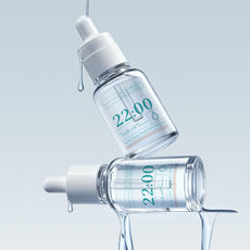 22:00 アネトス セラム2点セット＋クリーム付き【初回限定特典】のセラムボトルが水滴と共に浮いている画像